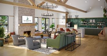 a living room with couches and chairs and a fireplace